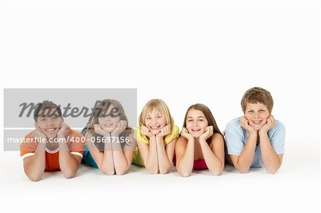 Group Of Five Young Children In Studio