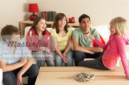 Group Of Children ChattingAt Home