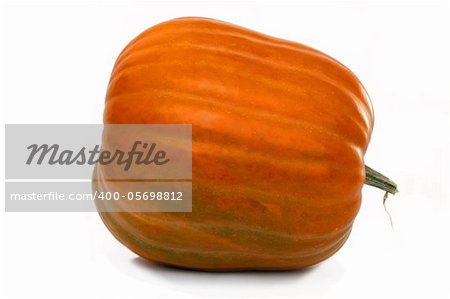 Orange pumpkin lying on one side. Isolated on white.