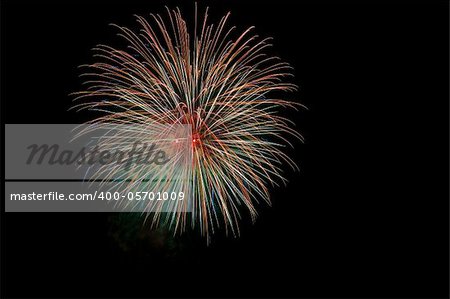 Colorful fireworks isolated over a dark background