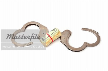 handcuffs and dollars on a white background
