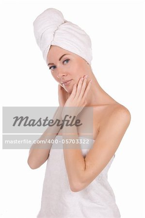 Woman after bath with towel isolated on white