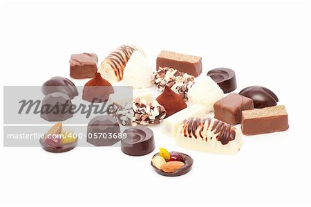 Various chocolate pralines isolated on white background