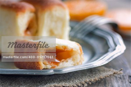 Delicious jam rolls. Baked pastry filled with fruit marmelade.