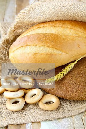 assortment of baked bread on wood table