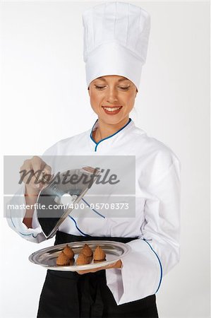 happy smiling caucasian female chef introducing new dish