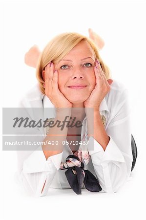 A picture of a beautiful mature woman lying over white background