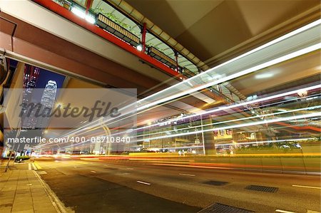 car light trails in modern city