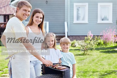 Family barbecue on the lawn