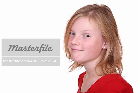 Portrait of a young blond girl on white background