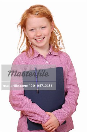 Portrait of a young red haired schoolgirl on white background