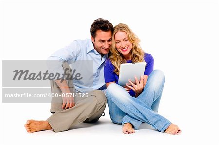 couple using digital tablet