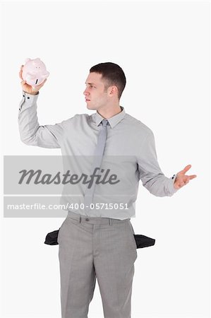 Portrait of a broke businessman against a white background