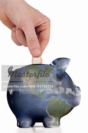 Hand inserting a coin in a pink piggy bank against a white background.