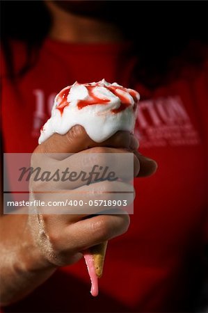 Ice cream mealting in the hands