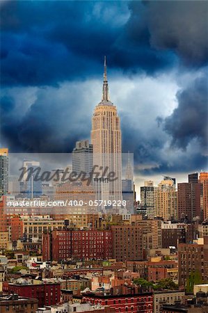 New York city skyline on cloudy day. View of Empire State and Chrysler building.