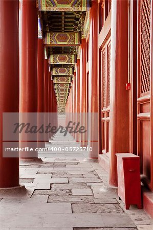 A long colonnade of red pillars along the West building of the Taimiao Ancestral Temple in Beijing, China. The temple is now the People's Cultural Palace.