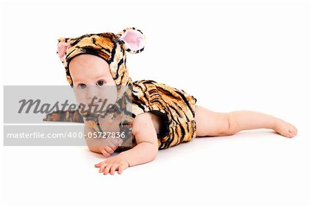 Portrait of cute little boy in tiger costume