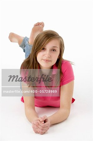 Teenage Girl Laying On Stomach