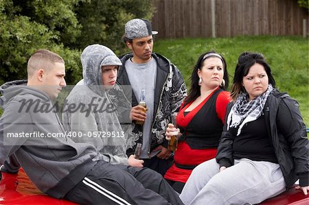 Gang Of Youths Sitting On Cars