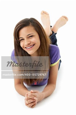 Teenage Girl Laying on Stomach