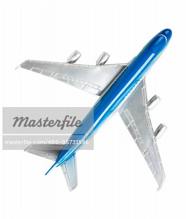 Passanger airplane toy isolated over white background. Top view.