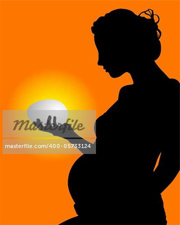 silhouette of a pregnant woman with an egg in his hand on an orange background