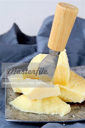 parmesan cheese  with knife