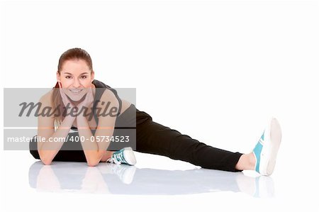 Pretty fitness woman doing stretching exercise on white
