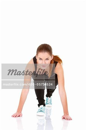 Cute fitness woman doing stretching exercise on white
