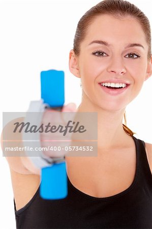 Portrait of fitness woman working out with free weights on white