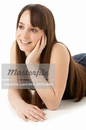 Studio Portrait Of Teenage Girl On White Background