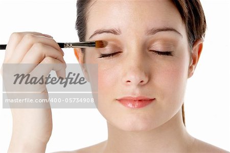 Teenage Girl Applying Make Up