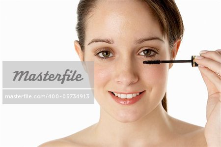 Teenage Girl Applying Make Up