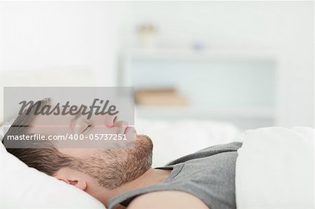 Quiet man sleeping in his bedroom