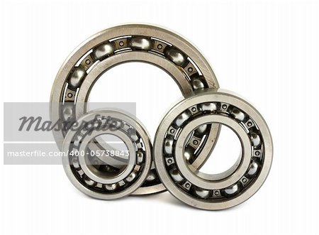 Three steel ball bearings isolated on a white background