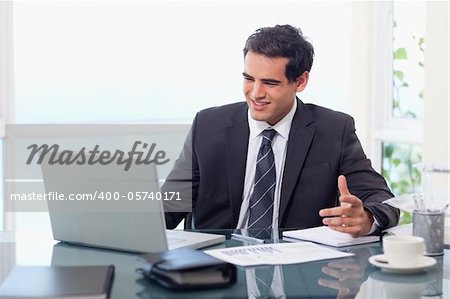 Upset businessman during a video conference in his office