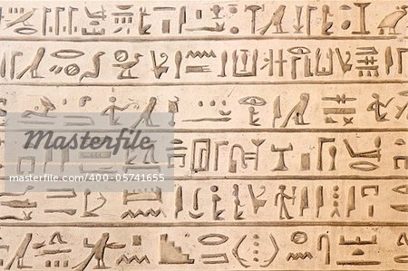 Ancient egyptian hieroglyphics carved in the stone