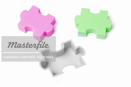 Plastic jigsaw puzzles on white background