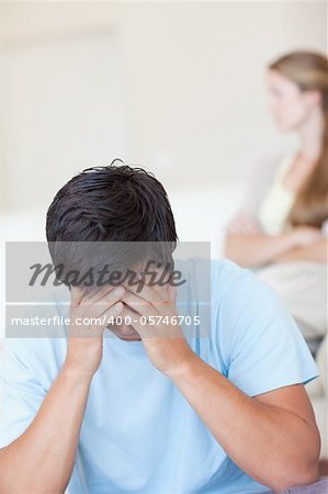 Portrait of a couple after an argument in their living room