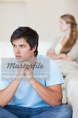 Portrait of an upset couple after an argument in their living room