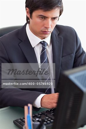 Portrait of a businessman working with a computer in his office