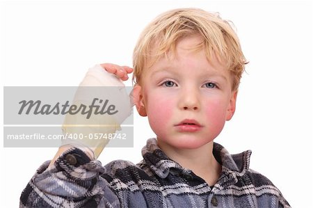 Portrait of a sad child with his hand hurt