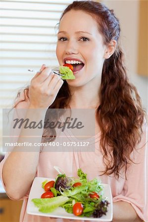 Girl having some salad