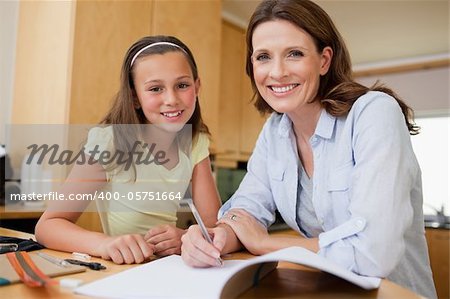 Mother and daughter doing homework together