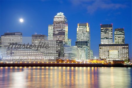 Full moon over London skyscrapers