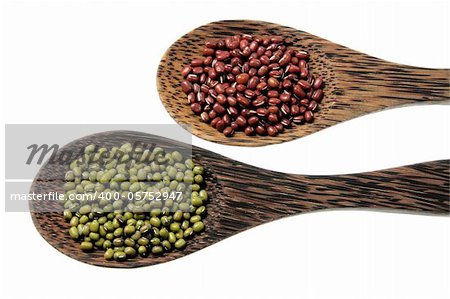 Wooden Spoons with Beans on White Background