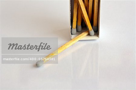 Gray head matches with box on white background