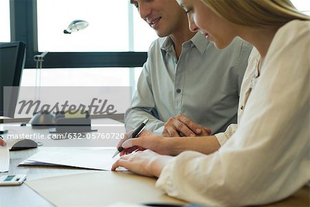 Couple signing contract