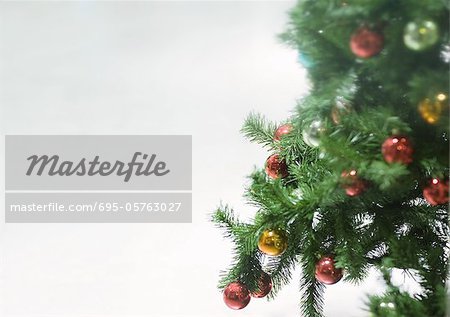 Christmas decorations on tree, close-up